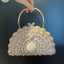 Minaudière en cristal paon avec poignée