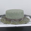 Light avocado green raffia straw bucket hat side view