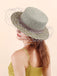 Light avocado green raffia straw bucket hat side view