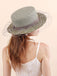 Light avocado green raffia straw bucket hat back view