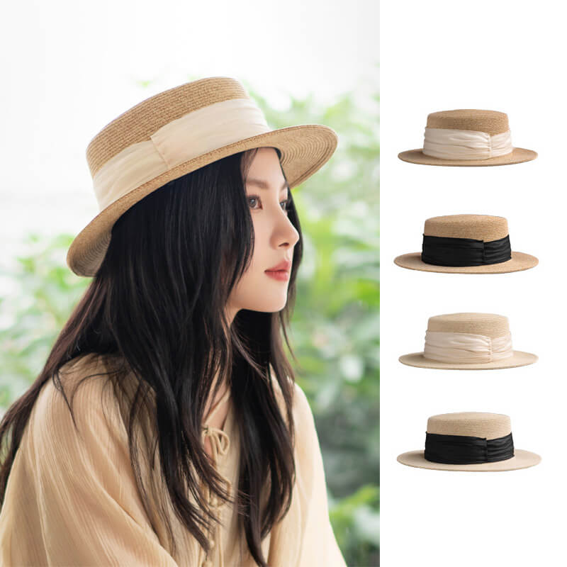 Model wearing beige boater hat with sheer black band – summer outfit