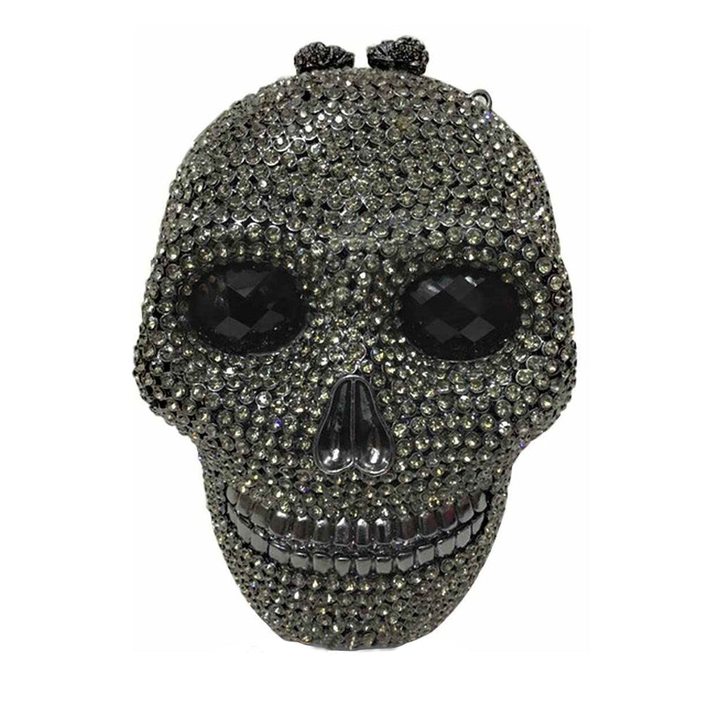 grey skull-shaped clutch bag with rhinestone embellishments on a white background
