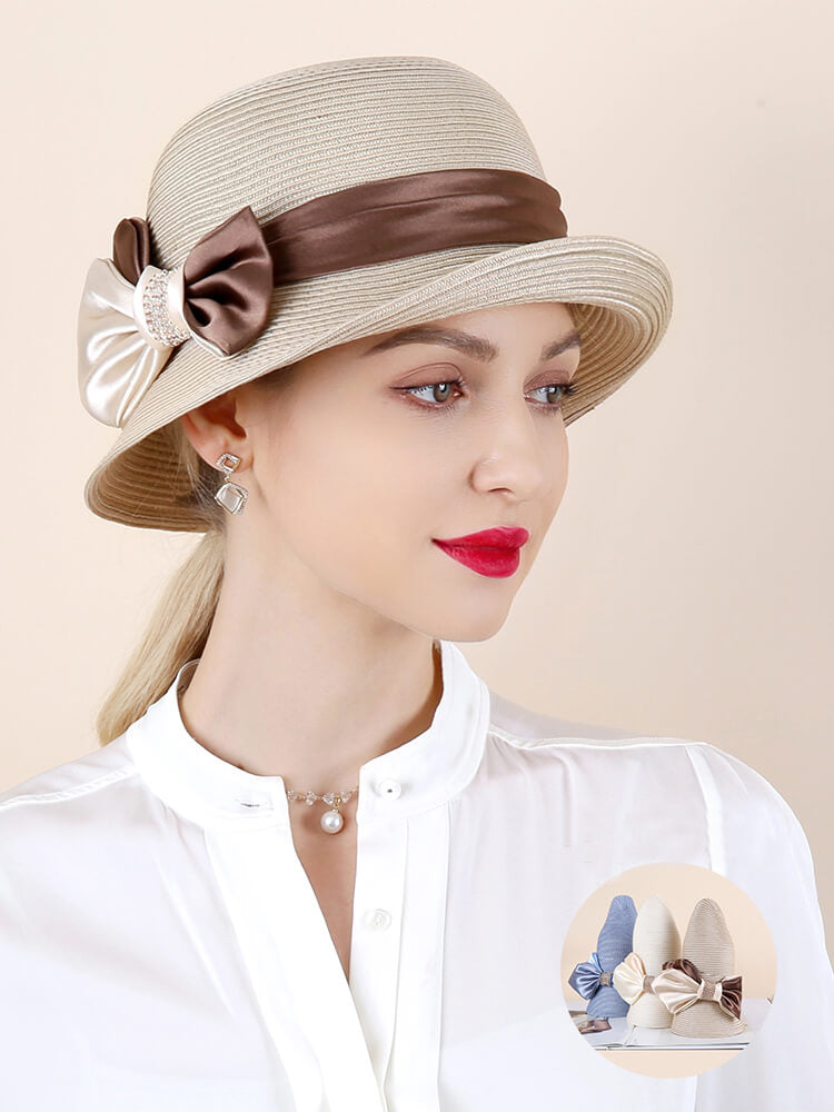 Model showcasing beige summer hat with double-color satin bow