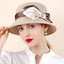 Lightweight straw-like women’s hat with champagne coffee ribbon