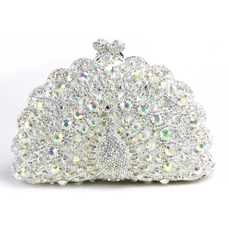 Luxuriöse Clutch mit Strasssteinen und Pfauenmotiv