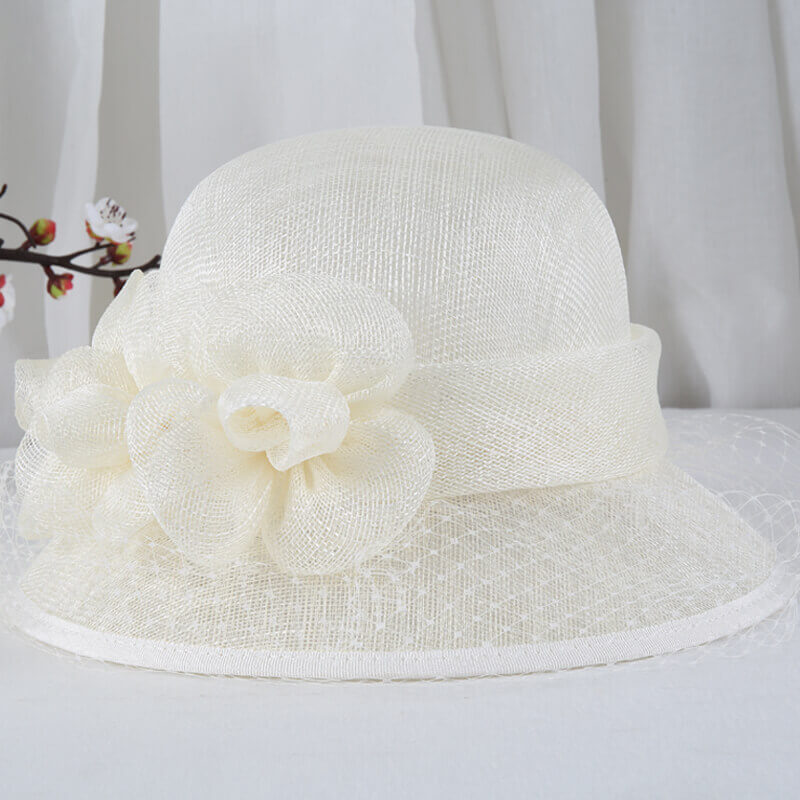 White Sinamay summer derby hat with flower accents and veil