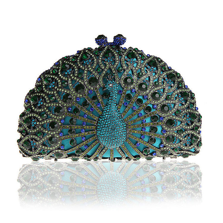 Luxuriöse Clutch mit Strasssteinen und Pfauenmotiv