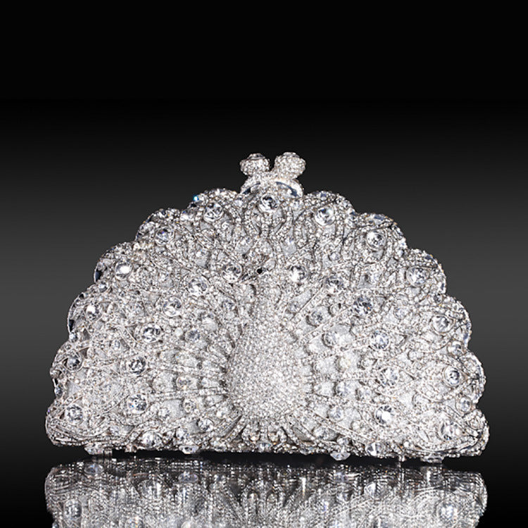Luxuriöse Clutch mit Strasssteinen und Pfauenmotiv