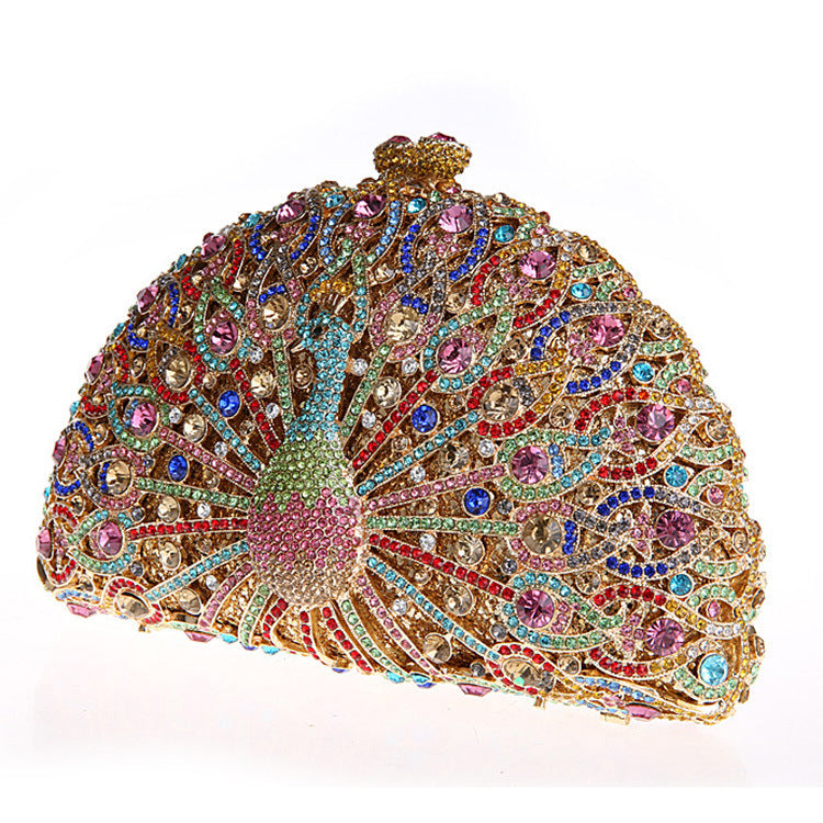 Luxuriöse Clutch mit Strasssteinen und Pfauenmotiv