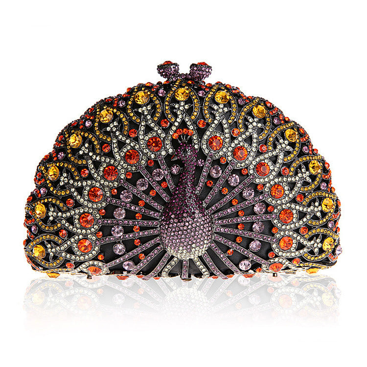 Luxuriöse Clutch mit Strasssteinen und Pfauenmotiv