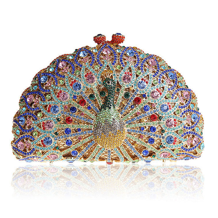 Luxuriöse Clutch mit Strasssteinen und Pfauenmotiv