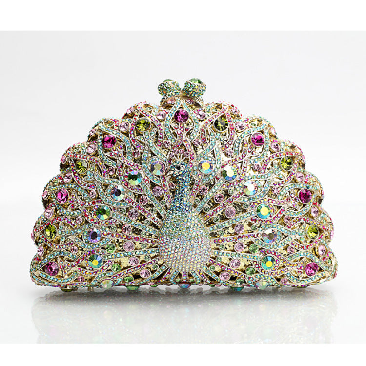 Luxuriöse Clutch mit Strasssteinen und Pfauenmotiv