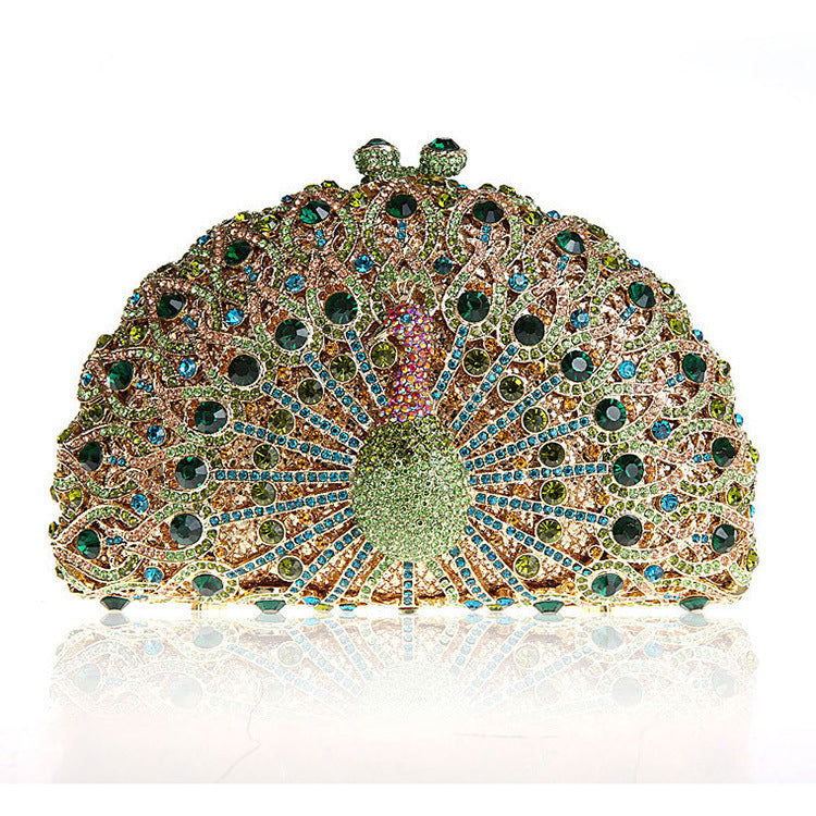 Luxuriöse Clutch mit Strasssteinen und Pfauenmotiv