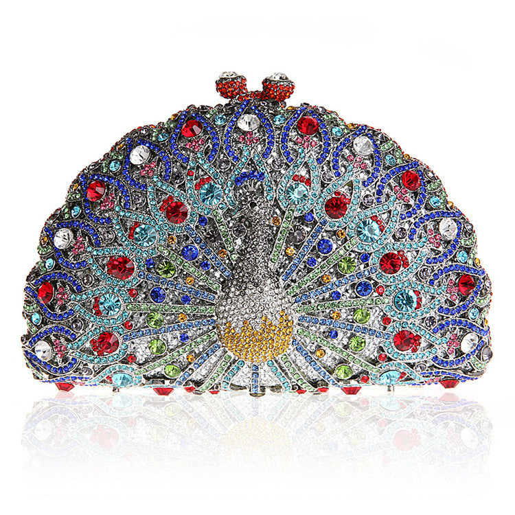 Luxuriöse Clutch mit Strasssteinen und Pfauenmotiv