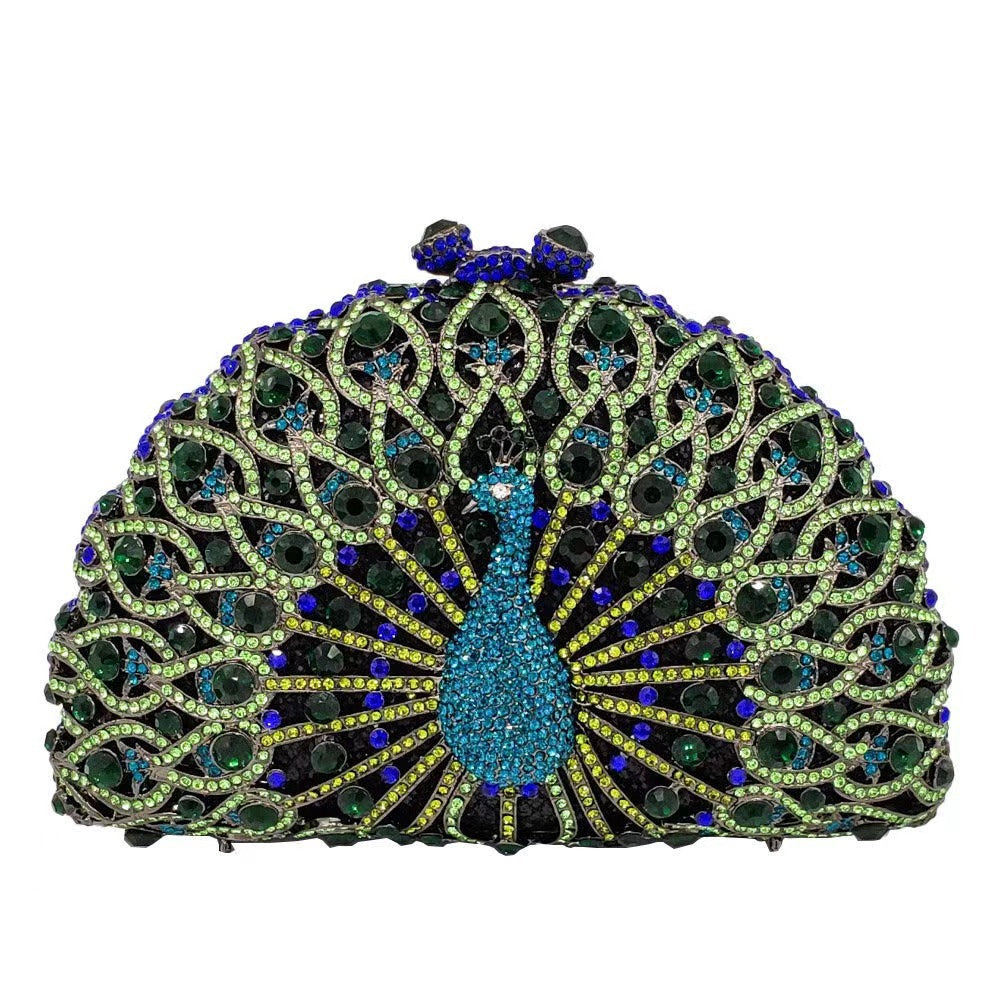 Luxuriöse Clutch mit Strasssteinen und Pfauenmotiv
