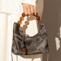 Classic Leather Dumpling Bag with Beaded Handle