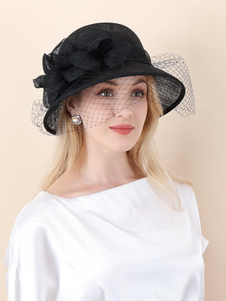 Black elegant derby hat with floral trim and delicate veil